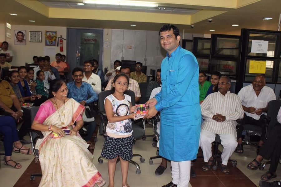 Presented Gifts to Meritorious Students of Share Holders of RNSB Surendranagar Branch.